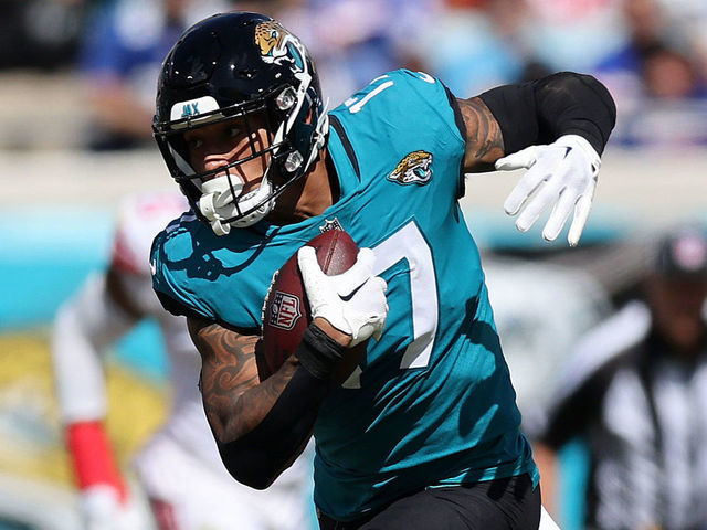 JACKSONVILLE, FLORIDA - OCTOBER 23: Evan Engram #17 of the Jacksonville Jaguars gets the first down in the first quarter against the New York Giants at TIAA Bank Field on October 23, 2022 in Jacksonville, Florida.