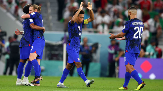 DOHA, QATAR - NOVEMBER 29: Tyler Adams of USA Cameron Carter Vickers of USA celebrates as Christian Pulisic of USA scores their first goal during the FIFA World Cup Qatar 2022 Group B match between IR Iran and USA at Al Thumama Stadium on November 29, 2022 in Doha, Qatar.