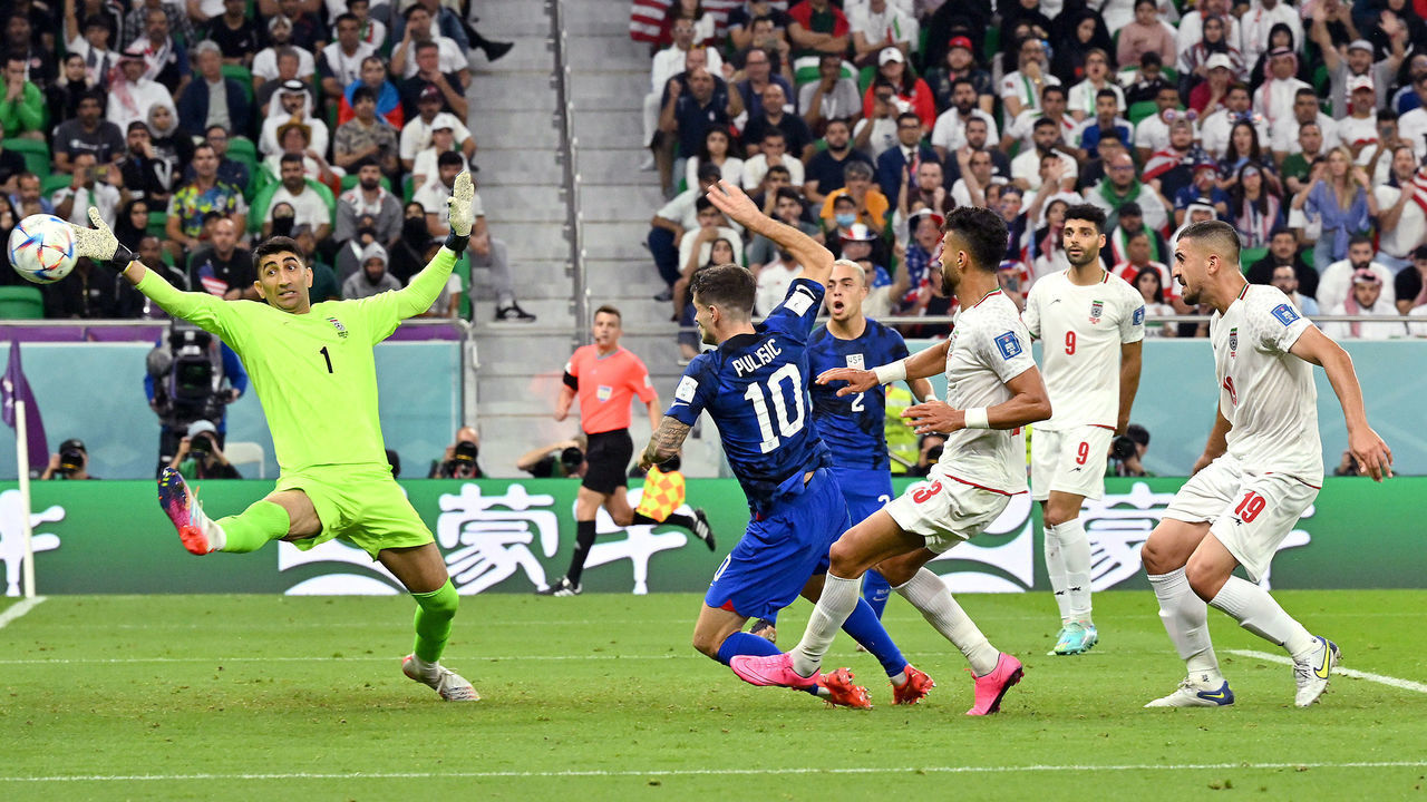 DOHA, QATAR - NOVEMBER 29: Christian Pulisic of United States scores their team's first goa during the FIFA World Cup Qatar 2022 Group B match between IR Iran and USA at Al Thumama Stadium on November 29, 2022 in Doha, Qatar.