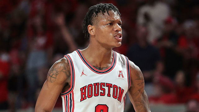 HOUSTON, TEXAS - NOVEMBER 29: Marcus Sasser #0 of the Houston Cougars reacts after making a three point basket against the Norfolk State Spartans during the first half at Fertitta Center on November 29, 2022 in Houston, Texas.