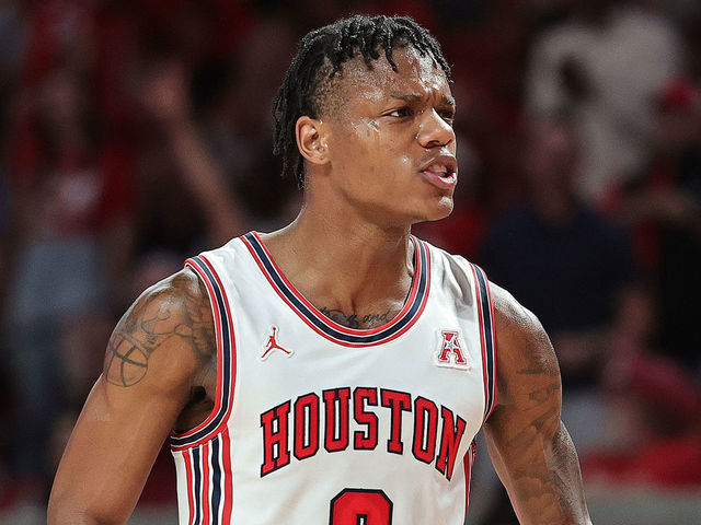HOUSTON, TEXAS - NOVEMBER 29: Marcus Sasser #0 of the Houston Cougars reacts after making a three point basket against the Norfolk State Spartans during the first half at Fertitta Center on November 29, 2022 in Houston, Texas.