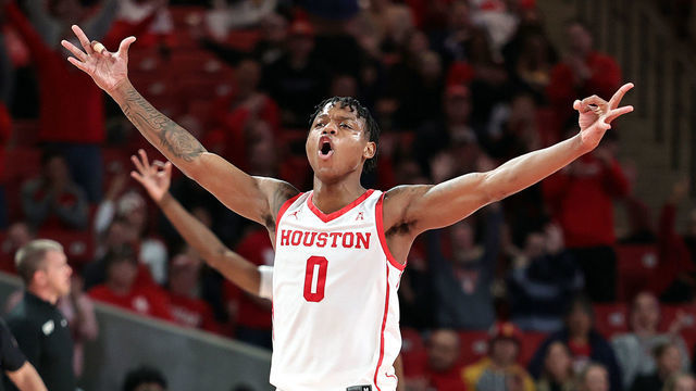 HOUSTON, TEXAS - NOVEMBER 14: Marcus Sasser #0 of the Houston Cougars reacts after a three point basket during the second half against the Oral Roberts Golden Eagles at Fertitta Center on November 14, 2022 in Houston, Texas.