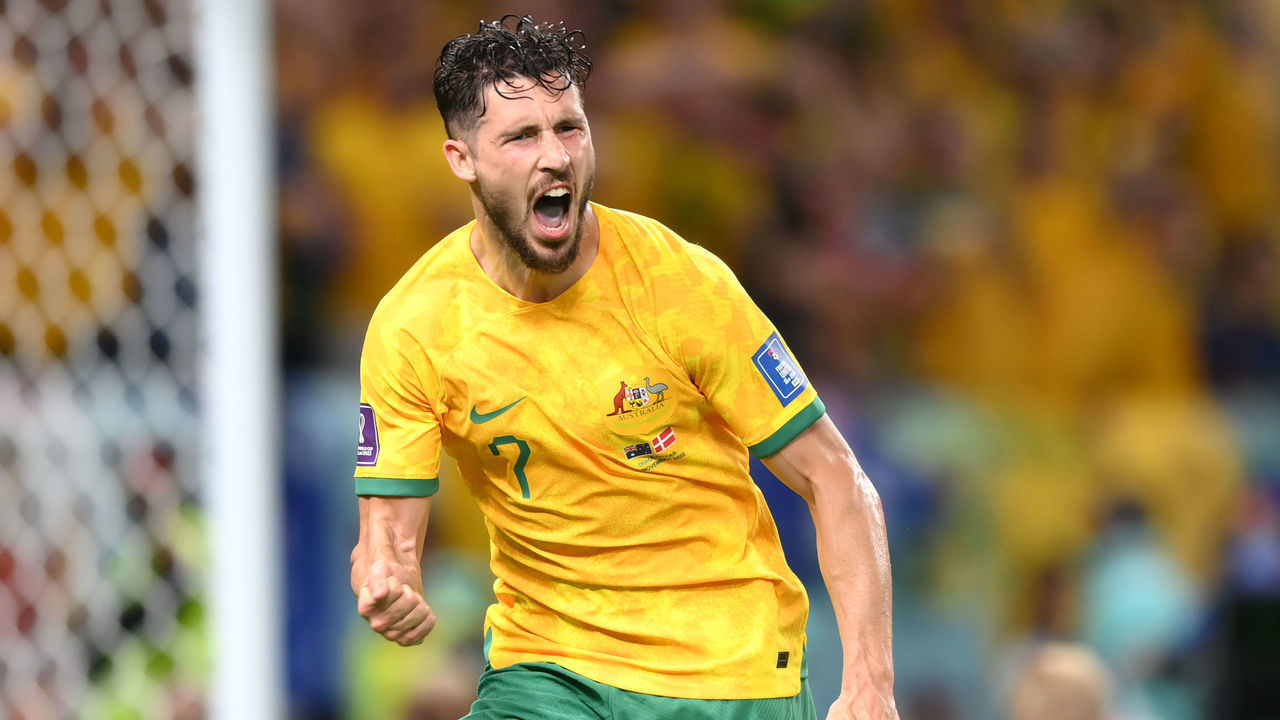 AL WAKRAH, QATAR - NOVEMBER 30: Mathew Leckie of Australia celebrates after scoring their team's first goal during the FIFA World Cup Qatar 2022 Group D match between Australia and Denmark at Al Janoub Stadium on November 30, 2022 in Al Wakrah, Qatar.