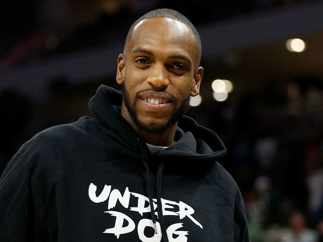 MILWAUKEE, WISCONSIN - OCTOBER 26: Khris Middleton #22 of the Milwaukee Bucks in street clothes as he recovers from an injury after the game against the Brooklyn Nets at Fiserv Forum on October 26, 2022 in Milwaukee, Wisconsin.