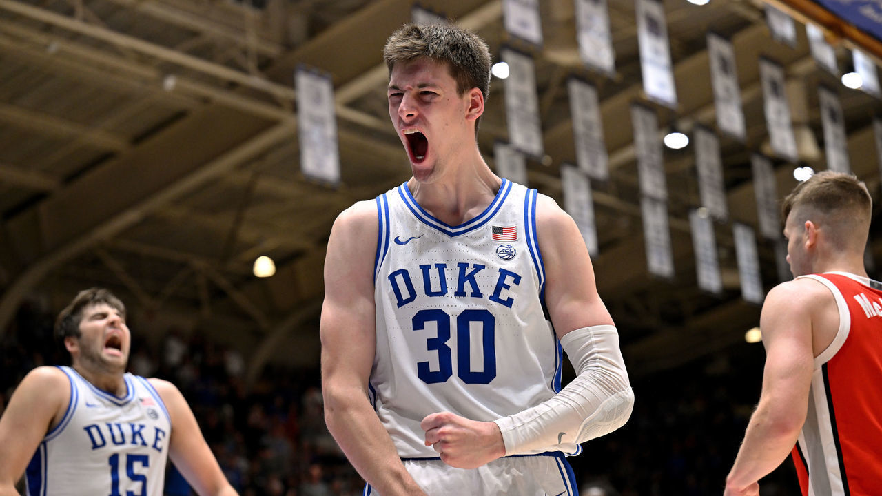 DURHAM, NORTH CAROLINA - NOVEMBER 30: Kyle Filipowski #30 of the Duke Blue Devils reacts after scoring and drawing a foul against the Ohio State Buckeyes during the second half of their game at Cameron Indoor Stadium on November 30, 2022 in Durham, North Carolina. The Blue Devils won 81-72.