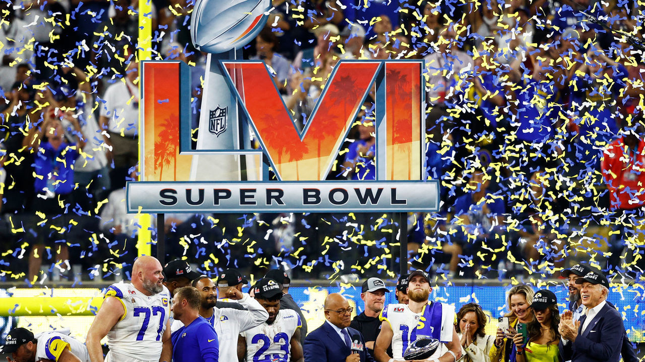 INGLEWOOD, CALIFORNIA - FEBRUARY 13: Cooper Kupp #10 of the Los Angeles Rams holds the Vince Lombardi Trophy after Super Bowl LVI at SoFi Stadium on February 13, 2022 in Inglewood, California. The Los Angeles Rams defeated the Cincinnati Bengals 23-20.