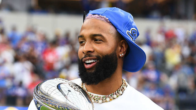 INGLEWOOD, CA - SEPTEMBER 08: Former Los Angeles Rams wide receiver Odell Beckham Jr. holds the Super Bowl trophy before the NFL game between the Buffalo Bills and the Los Angeles Rams on September 8, 2022, at SoFi Stadium in Inglewood, CA.