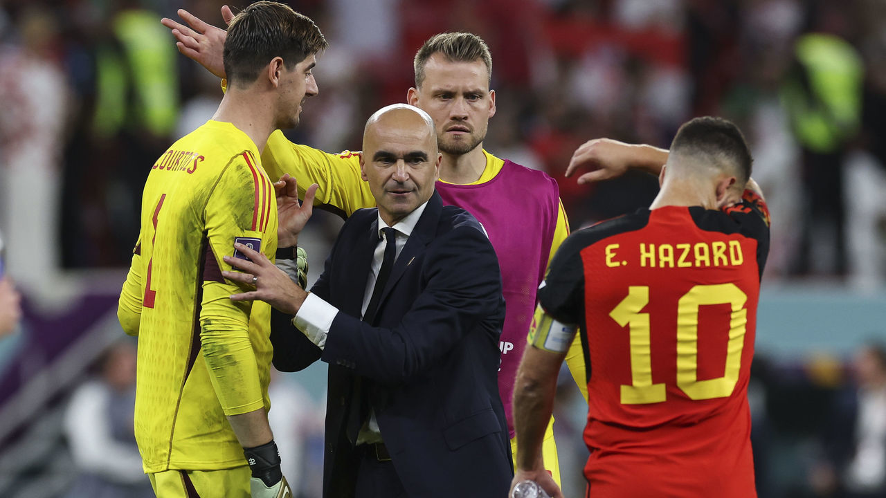 DOHA, QATAR - DECEMBER 01: Belgium head coach Roberto Martinez is seen at full time with Thibaut Courtois of Belgium during the FIFA World Cup Qatar 2022 Group F match between Croatia and Belgium at Ahmad Bin Ali Stadium on December 01, 2022 in Doha, Qatar.
