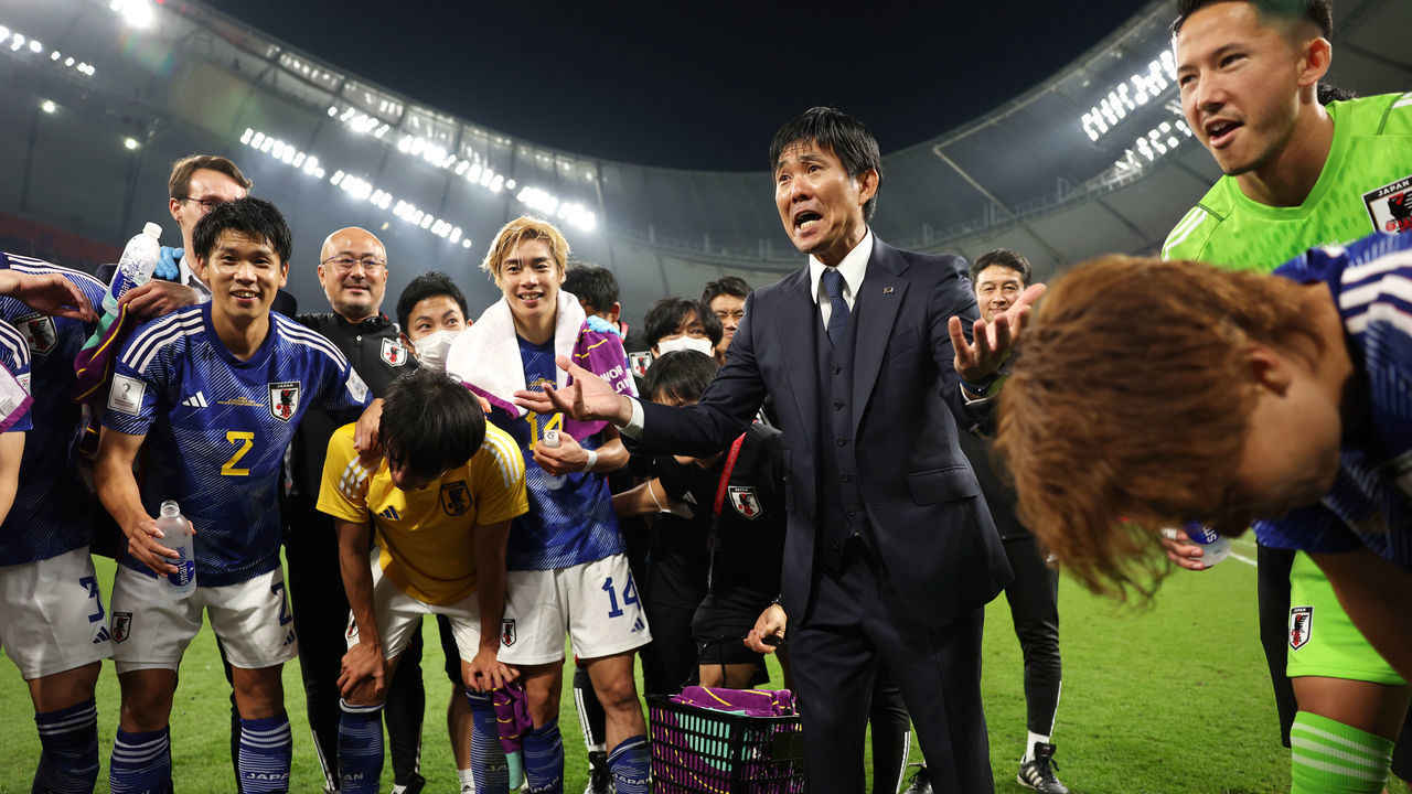 DOHA, QATAR - DECEMBER 01: Hajime Moriyasu, Head Coach of Japan, speaks to players after their 2-1 victory and qualification for the knockout stage after the FIFA World Cup Qatar 2022 Group E match between Japan and Spain at Khalifa International Stadium on December 01, 2022 in Doha, Qatar.