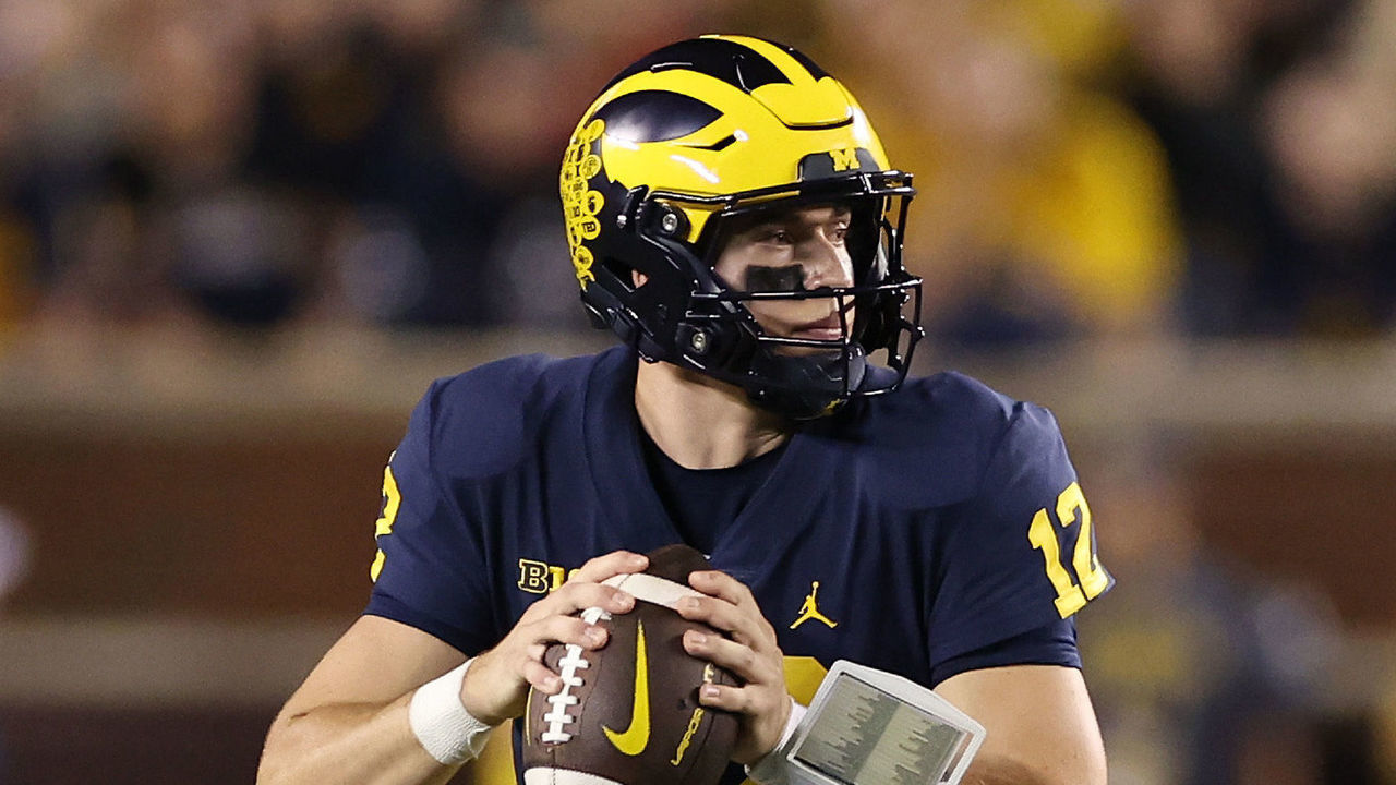 ANN ARBOR, MICHIGAN - SEPTEMBER 10: Cade McNamara #12 of the Michigan Wolverines throws a first half pass while playing the Hawaii Warriors at Michigan Stadium on September 10, 2022 in Ann Arbor, Michigan.