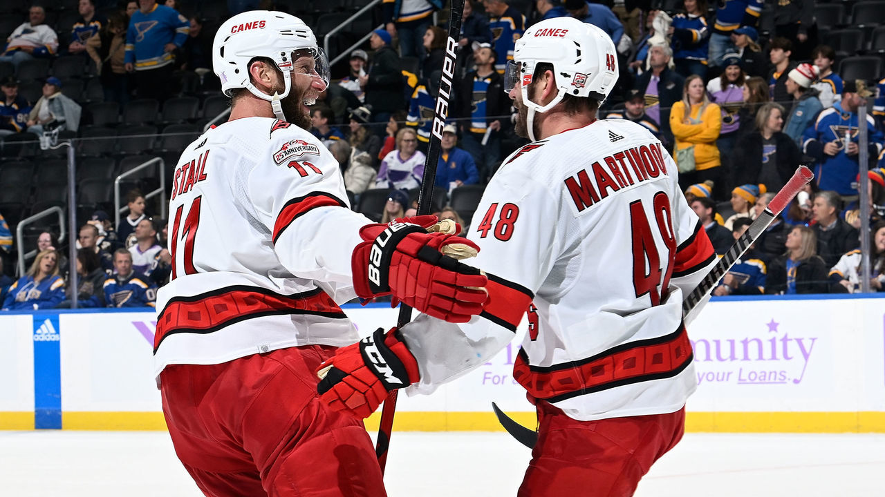 ST. LOUIS, MO - DECEMBER 1: Jordan Martinook #48 of the Carolina Hurricanes is congratulated after scoring his third goal of the game against the St. Louis Blues at the Enterprise Center on December 1, 2022 in St. Louis, Missouri.