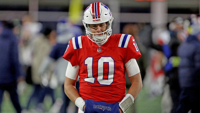 FOXBORO, MA - December 2: Mac Jones #10 of the New England Patriots walks off the field after losing 24-10 against the Buffalo Bills at Gillette Stadium on December 2, 2022 in Foxboro, Massachusetts.