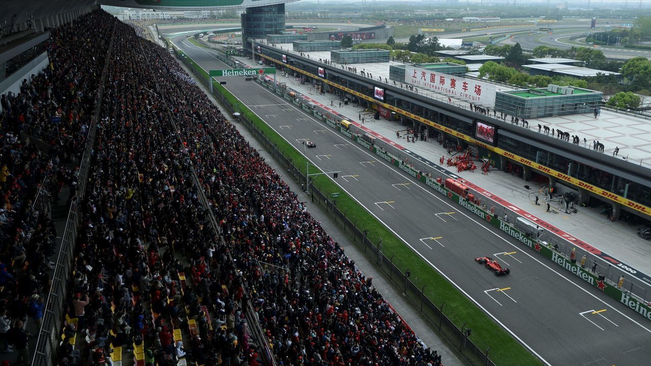 This general view shows spectators watching the Formula One Chinese Grand Prix in Shanghai on April 14, 2019.
