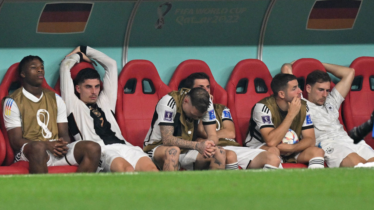 Germany players look dejected after Germany failed to qualify in the Qatar 2022 World Cup Group E football match between Costa Rica and Germany at the Al-Bayt Stadium in Al Khor, north of Doha on December 1, 2022.