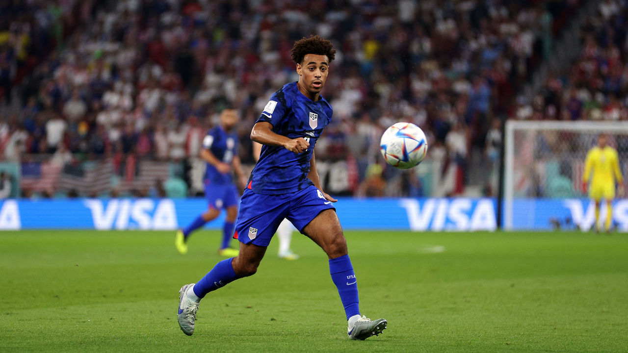 DOHA, QATAR - NOVEMBER 29: Tyler Adams of USA in action during the FIFA World Cup Qatar 2022 Group B match between IR Iran and USA at Al Thumama Stadium on November 29, 2022 in Doha, Qatar.