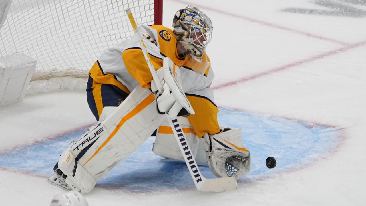 ELMONT, NY - DECEMBER 02: Nashville Predators Goalie Kevin Lankinen (32) makes a save during the first period of the National Hockey League game between the Nashville Predators and New York Islanders on December 2, 2022, at UBS Arena in Elmont, NY.