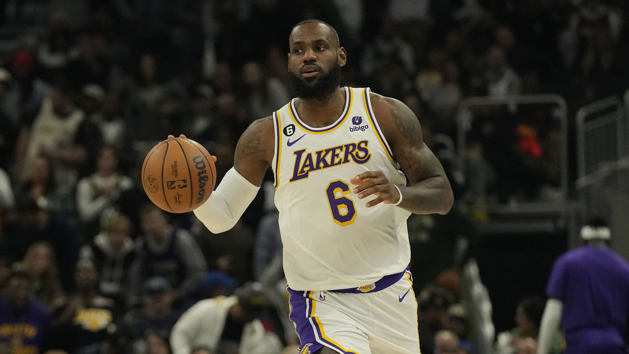 MILWAUKEE, WISCONSIN - DECEMBER 02: LeBron James #6 of the Los Angeles Lakers dribbles the ball against the Milwaukee Bucks during the first half at Fiserv Forum on December 02, 2022 in Milwaukee, Wisconsin.