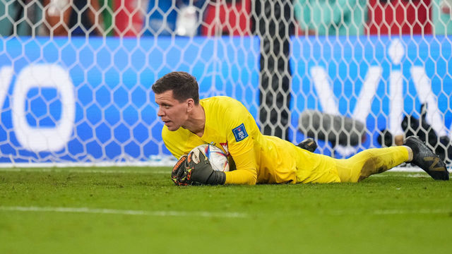 (1) SZCZESNY Wojciech of team Poland battle trying to score during the FIFA World Cup Qatar 2022 Group C match between Poland and Argentina at Stadium 974 on 30 November 2022 in Doha, Qatar.