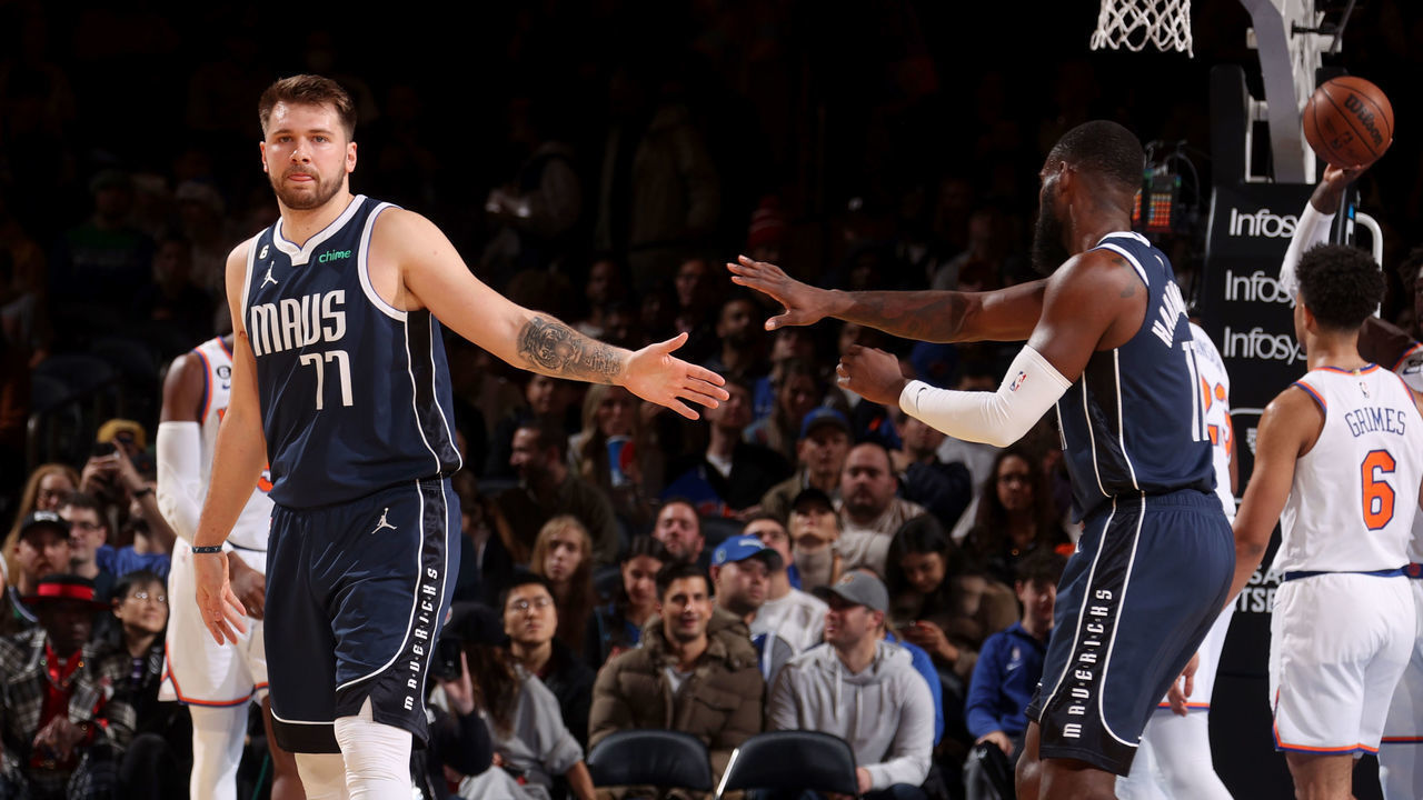 NEW YORK, NY - DECEMBER 3: Luka Doncic #77 of the Dallas Mavericks high fives Tim Hardaway Jr. #11 of the Dallas Mavericks during the game against the New York Knicks on December 3, 2022 at Madison Square Garden in New York City, New York. Mandatory Copyright Notice: Copyright 2022 NBAE
