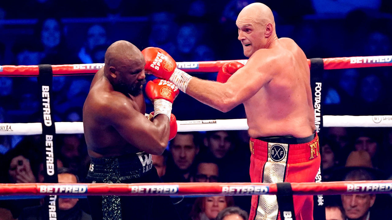 Tyson Fury (right) in action against Derek Chisora during their WBC World Heavyweight title fight at the Tottenham Hotspur Stadium, London. Picture date: Saturday December 3, 2022.