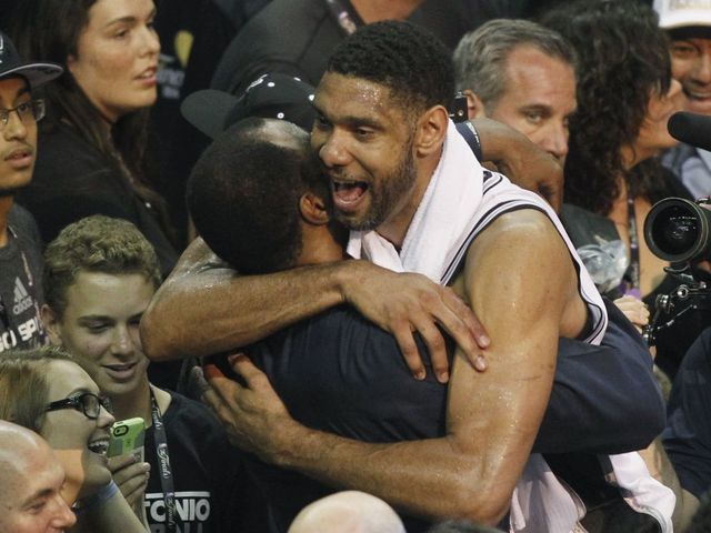 VIDEO: Tim Duncan jumps into David Robinson's arms after winning NBA title