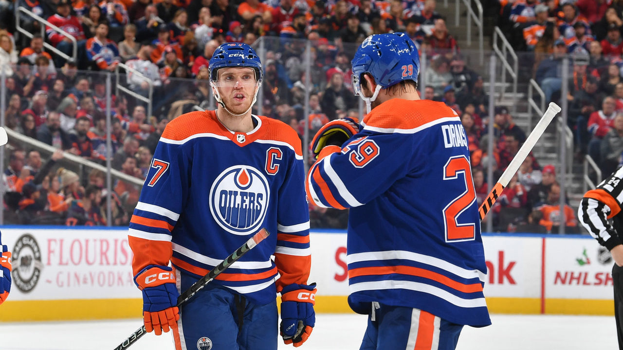 EDMONTON, CANADA - DECEMBER 3: Connor McDavid #97 and Leon Draisaitl #29 of the Edmonton Oilers discuss the play during the game against the Montreal Canadiens on December 3, 2022 at Rogers Place in Edmonton, Alberta, Canada.