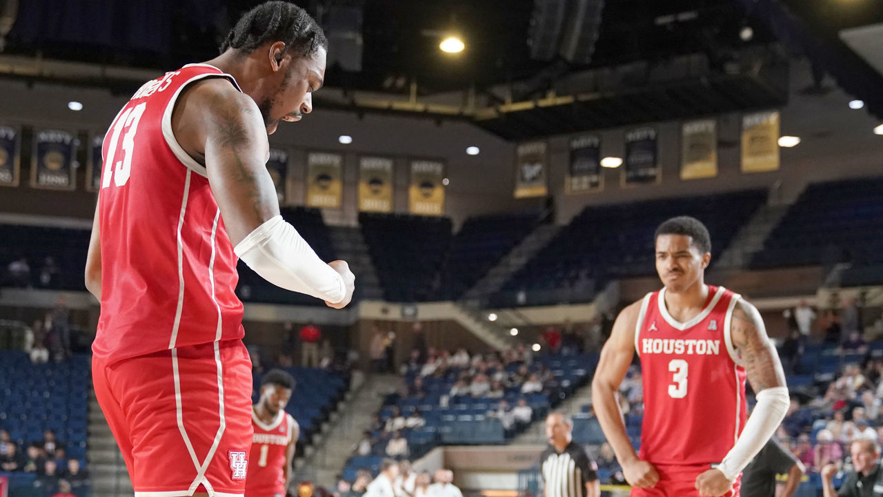 ANNAPOLIS, MD - NOVEMBER 11: J'Wan Roberts #13 and Ramon Walker Jr. #3 of the Houston Cougars of the Houston Cougars celebrates a shot during the Veterans Classic college basketball game against the Saint Joseph's Hawks at Alumni Hall on November 11, 2022 in Annapolis, Maryland.