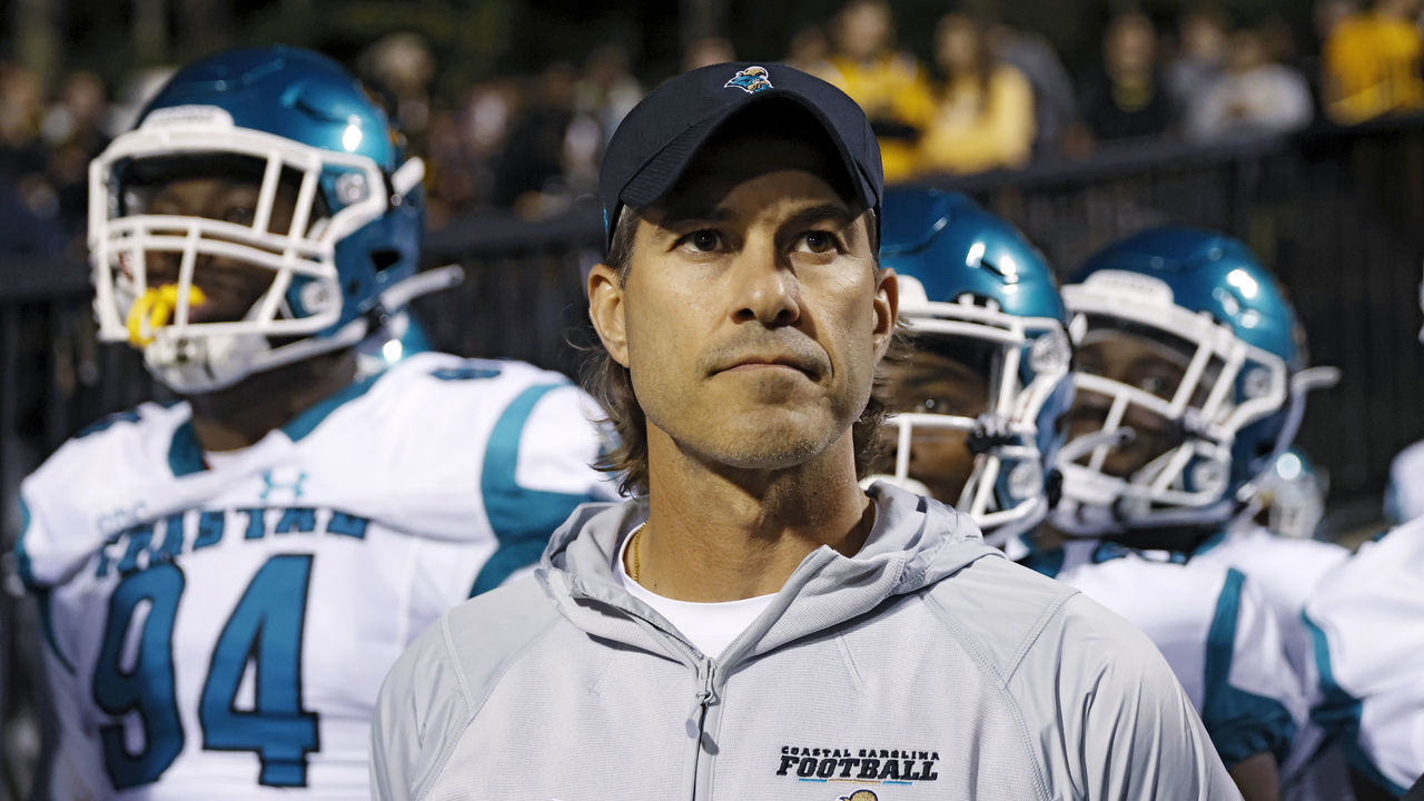 BOONE, NC - OCTOBER 20: Coastal Carolina Chanticleers head coach Jamey Chadwell stands with his team as they prepare to take the field prior to a college football game against the Appalachian State Mountaineers on Oct. 20, 2021 at Kidd Brewer Stadium in Boone, North Carolina.