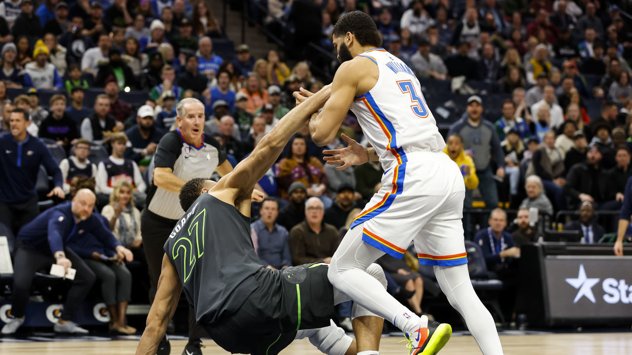 MINNEAPOLIS, MN - DECEMBER 03: Kenrich Williams #34 of the Oklahoma City Thunder and Rudy Gobert #27 of the Minnesota Timberwolves get into a scrum in the second quarter of the game at Target Center on December 3, 2022 in Minneapolis, Minnesota. Gobert was ejected after getting assessed a flagrant two foul.