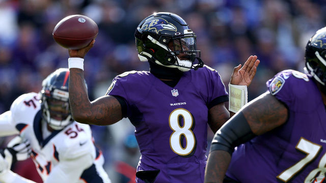 BALTIMORE, MARYLAND - DECEMBER 04: Lamar Jackson #8 of the Baltimore Ravens looks to pass in the first quarter of a game against the Denver Broncos at M&T Bank Stadium on December 04, 2022 in Baltimore, Maryland.