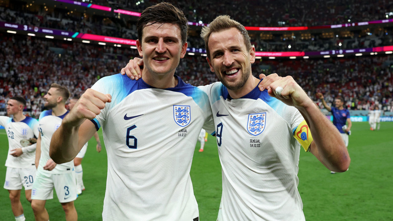 AL KHOR, QATAR - DECEMBER 04: Harry Maguire and Harry Kane of England celebrate following the FIFA World Cup Qatar 2022 Round of 16 match between England and Senegal at Al Bayt Stadium on December 04, 2022 in Al Khor, Qatar.