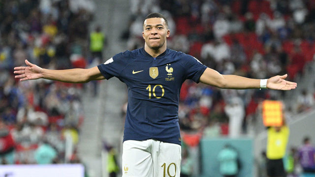DOHA, QATAR - DECEMBER 04: Kylian Mbappe of France reacts to his second goal during the FIFA World Cup Qatar 2022 Round of 16 match between France and Poland at Al Thumama Stadium on December 04, 2022 in Doha, Qatar.