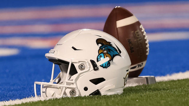 LAWRENCE, KS - SEPTEMBER 12: A view of a Coastal Carolina Chanticleers helmet and football before a college football game between the Coastal Carolina Chanticleers and Kansas Jayhawks on September 12, 2020 at Memorial Stadium in Lawrence, KS.