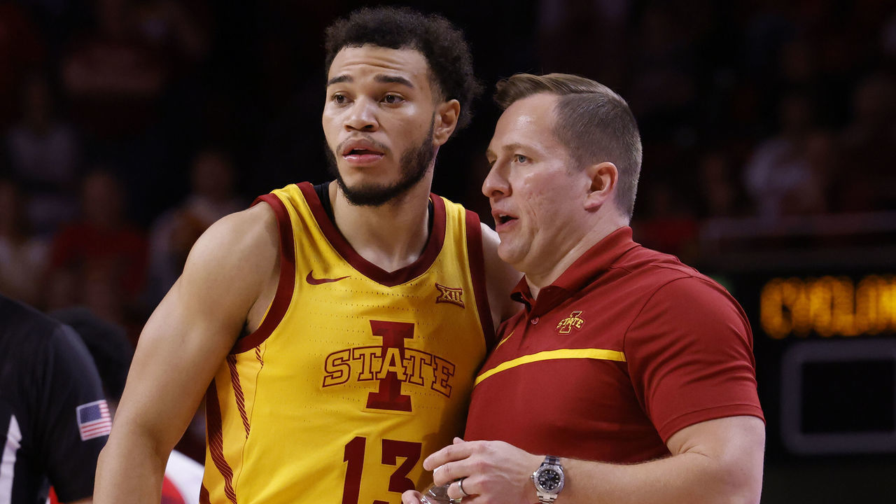 AMES, IA - DECEMBER 4: Head coach T. J. Otzelberger of the Iowa State Cyclones coaches Jaren Holmes #13 of the Iowa State Cyclones in the second half of play againstbn the St. John's Red Storm at Hilton Coliseum on December 4, 2022 in Ames, Iowa. The Iowa State Cyclones won 71-60 over the St. John's Red Storm.