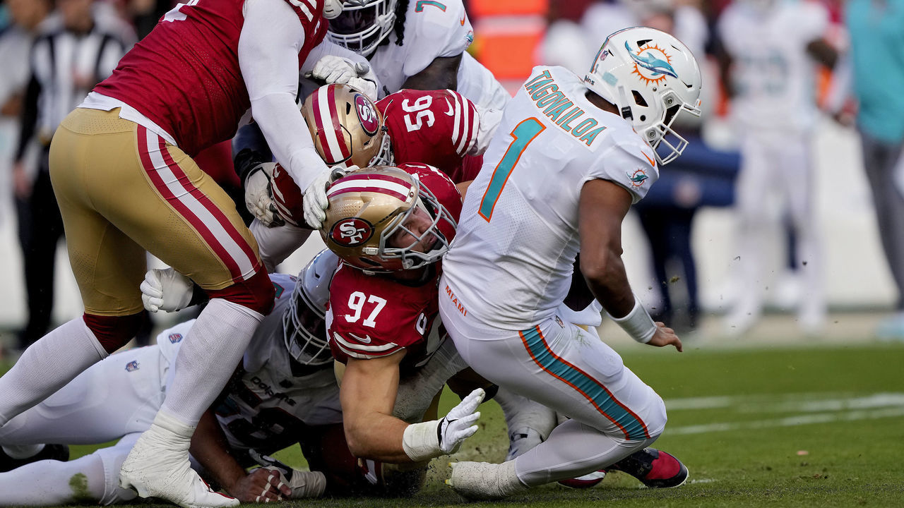 SANTA CLARA, CALIFORNIA - DECEMBER 04: Nick Bosa #97 of the San Francisco 49ers sacks Tua Tagovailoa #1 of the Miami Dolphins during the second quarter at Levi's Stadium on December 04, 2022 in Santa Clara, California.