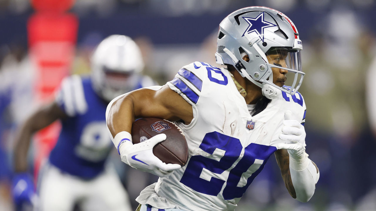ARLINGTON, TEXAS - DECEMBER 04: Tony Pollard #20 of the Dallas Cowboys runs with the ball in the second half of a game against the Indianapolis Colts at AT&T Stadium on December 04, 2022 in Arlington, Texas.