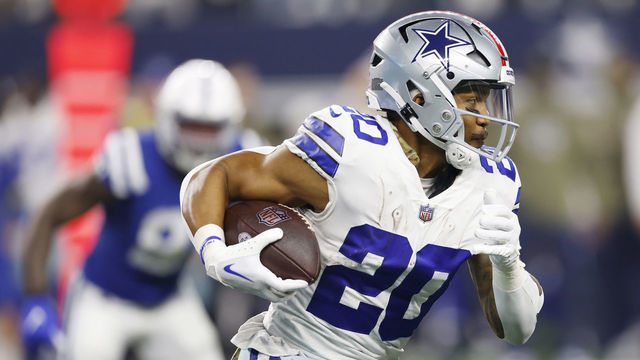 ARLINGTON, TEXAS - DECEMBER 04: Tony Pollard #20 of the Dallas Cowboys runs with the ball in the second half of a game against the Indianapolis Colts at AT&T Stadium on December 04, 2022 in Arlington, Texas.
