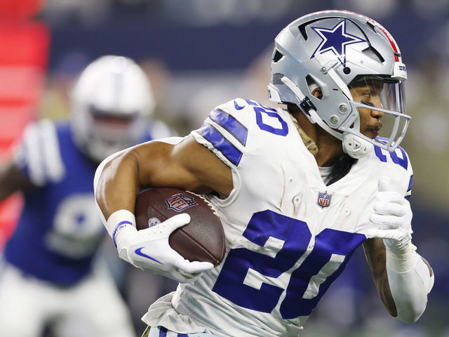 ARLINGTON, TEXAS - DECEMBER 04: Tony Pollard #20 of the Dallas Cowboys runs with the ball in the second half of a game against the Indianapolis Colts at AT&T Stadium on December 04, 2022 in Arlington, Texas.