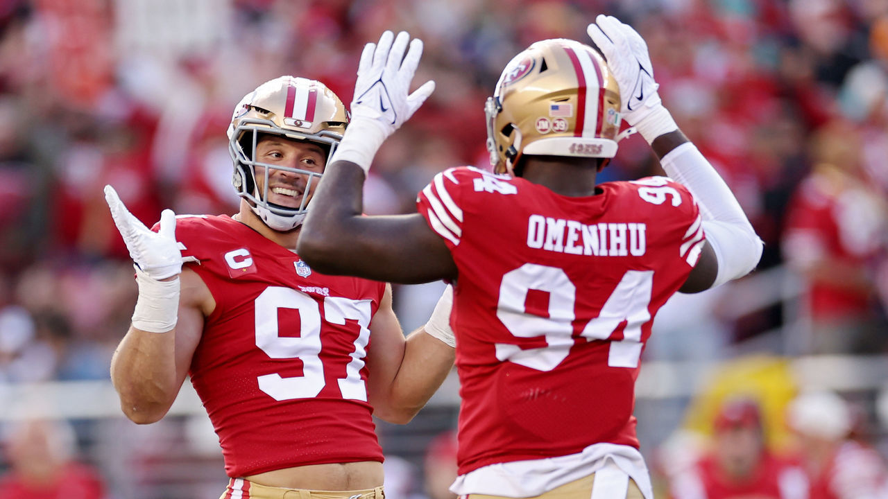 SANTA CLARA, CALIFORNIA - DECEMBER 04: Nick Bosa #97 of the San Francisco 49ers and Charles Omenihu #94 of the San Francisco 49ers celebrate after Bosa's sack during the first quarter against the Miami Dolphins at Levi's Stadium on December 04, 2022 in Santa Clara, California.