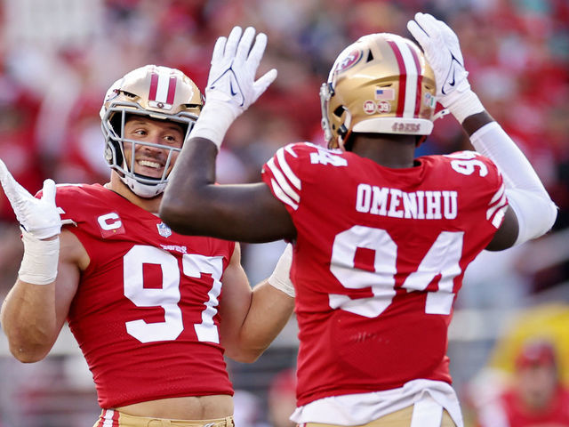 SANTA CLARA, CALIFORNIA - DECEMBER 04: Nick Bosa #97 of the San Francisco 49ers and Charles Omenihu #94 of the San Francisco 49ers celebrate after Bosa's sack during the first quarter against the Miami Dolphins at Levi's Stadium on December 04, 2022 in Santa Clara, California.