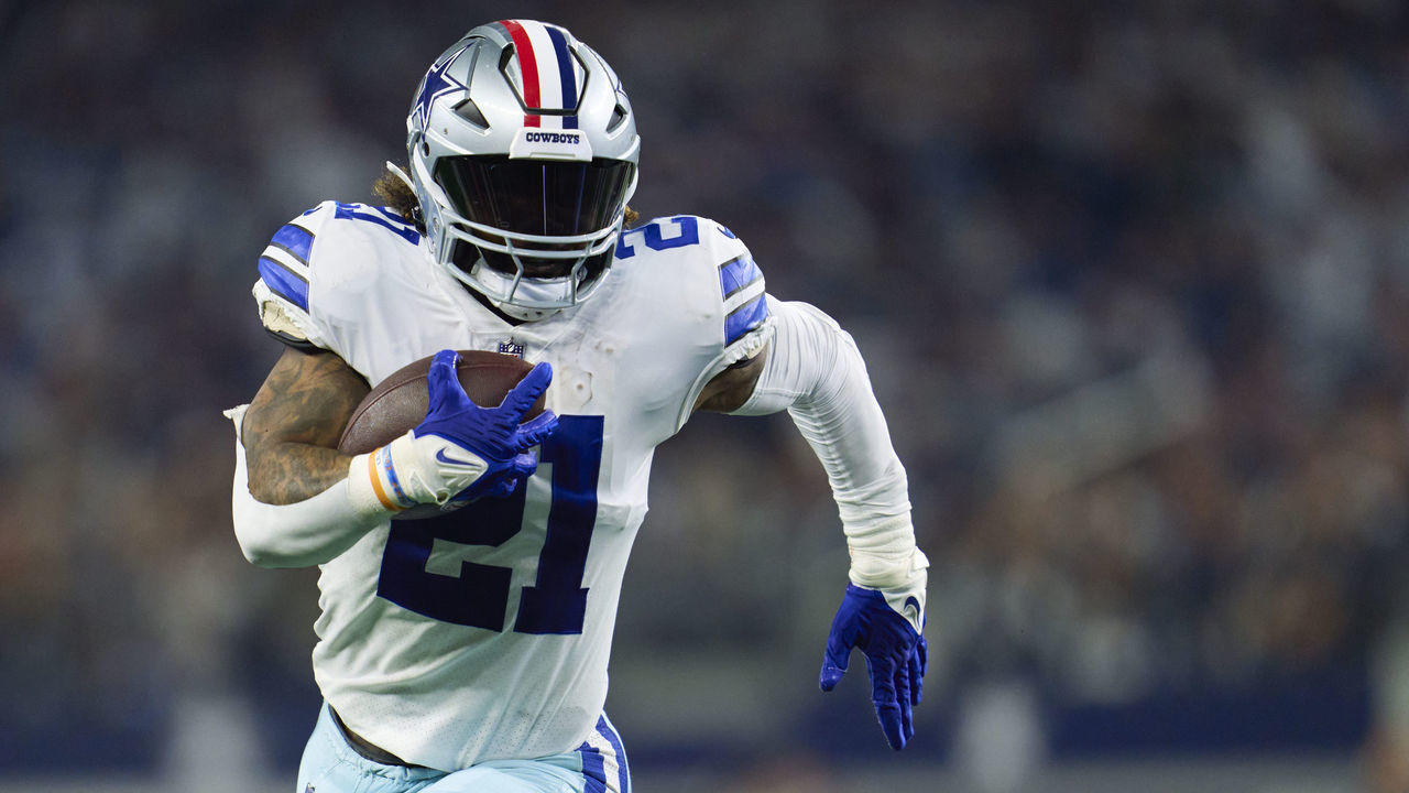 ARLINGTON, TX - DECEMBER 04: Ezekiel Elliott #21 of the Dallas Cowboys carries the ball against the Indianapolis Colts during the second half at AT&T Stadium on December 4, 2022 in Arlington, Texas.