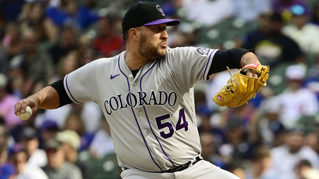 CHICAGO, ILLINOIS - SEPTEMBER 17: Carlos Estevez #54 of the Colorado Rockies pitches in the eighth inning against the Chicago Cubs at Wrigley Field on September 17, 2022 in Chicago, Illinois.