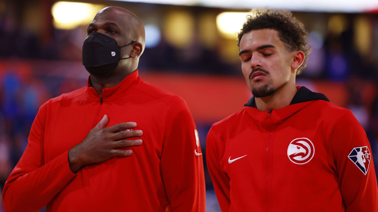 ORLANDO, FLORIDA - DECEMBER 15: Head coach Nate McMillan and Trae Young #11 of the Atlanta Hawks look on prior to the game against the Orlando Magic at Amway Center on December 15, 2021 in Orlando, Florida.