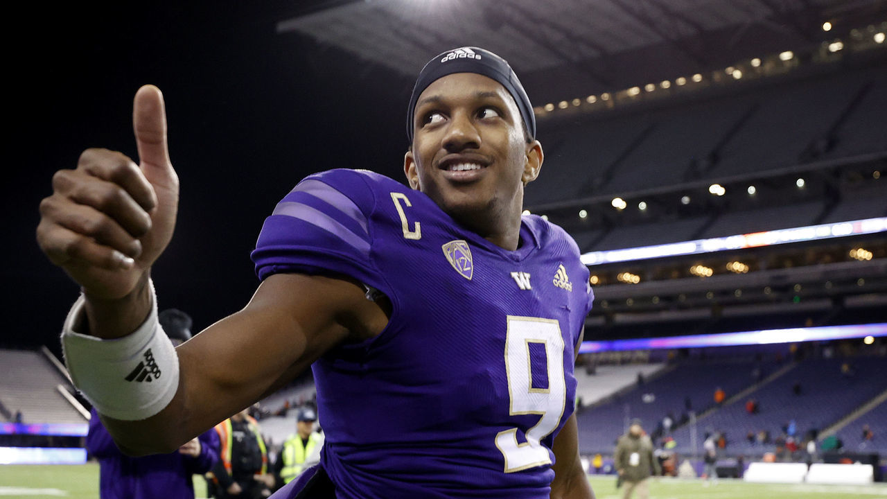 SEATTLE, WASHINGTON - NOVEMBER 04: Michael Penix Jr. #9 of the Washington Huskies celebrates after beating Oregon State Beavers 24-21 at Husky Stadium on November 04, 2022 in Seattle, Washington.