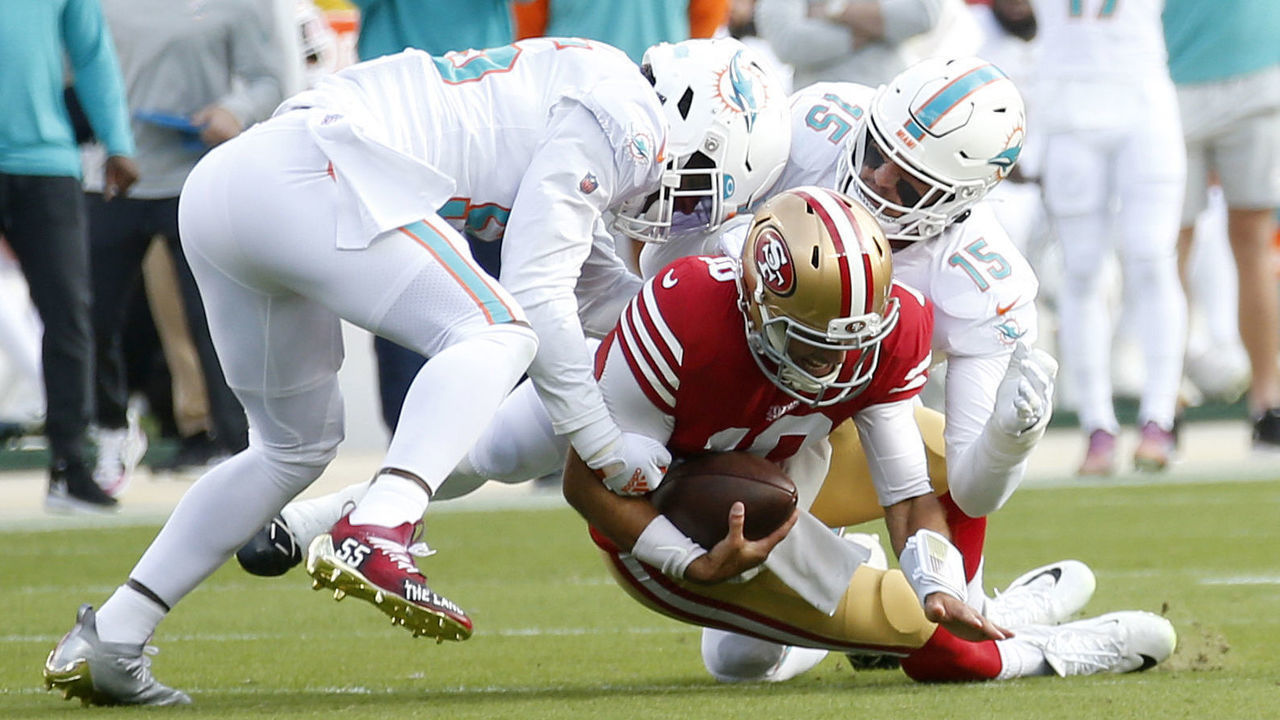 SANTA CLARA, CALIFORNIA - DECEMBER 04: San Francisco 49ers' Jimmy Garoppolo #10 is sacked in the first quarter of their NFL game against the Miami Dolphins at Levis Stadium in Santa Clara, Calif., on Sunday, Dec.4, 2022. Garoppolo fractured his foot on the play. (Jane Tyska/Digital First Media/East Bay Times via Getty Images)