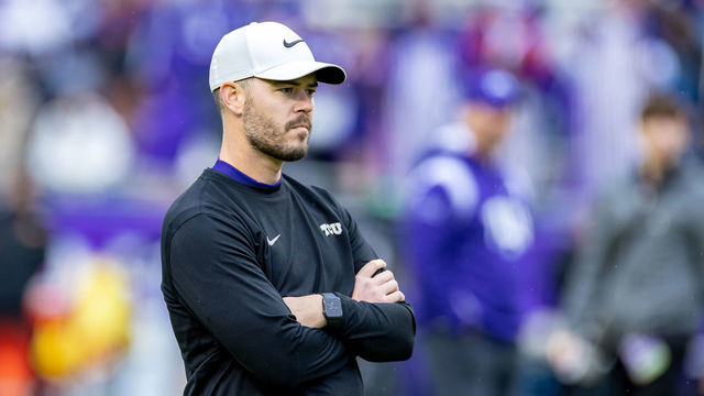FORT WORTH, TX - NOVEMBER 26: TCU offensive coordinator Garrett Riley looks on during warmups during the college football game between the Iowa State Cyclones and TCU Horned Frogs on November 26, 2022 at Amon G. Carter Stadium in Fort Worth, TX.