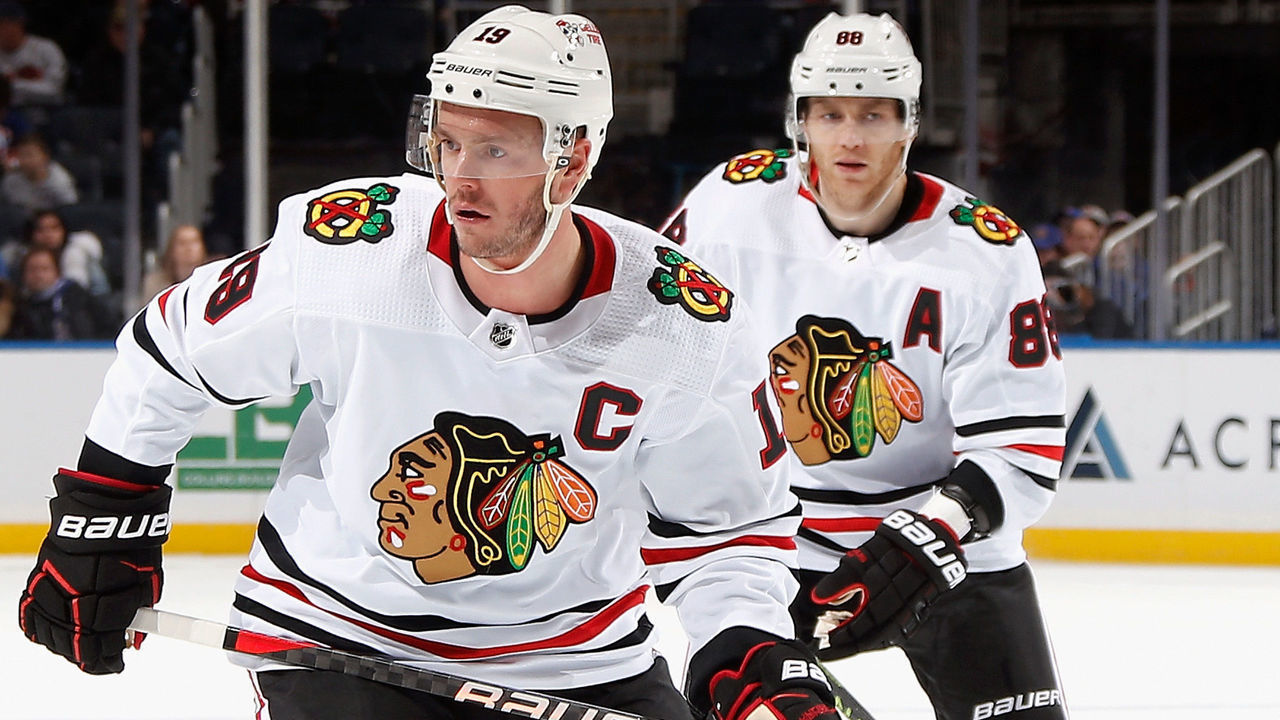 ELMONT, NEW YORK - DECEMBER 04: Jonathan Toews #19 and Patrick Kane #88 of the Chicago Blackhawks skates against the New York Islanders during the second period at the UBS Arena on December 04, 2022 in Elmont, New York.