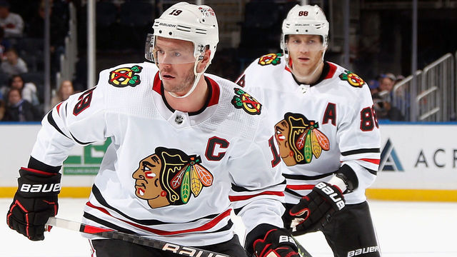 ELMONT, NEW YORK - DECEMBER 04: Jonathan Toews #19 and Patrick Kane #88 of the Chicago Blackhawks skates against the New York Islanders during the second period at the UBS Arena on December 04, 2022 in Elmont, New York.