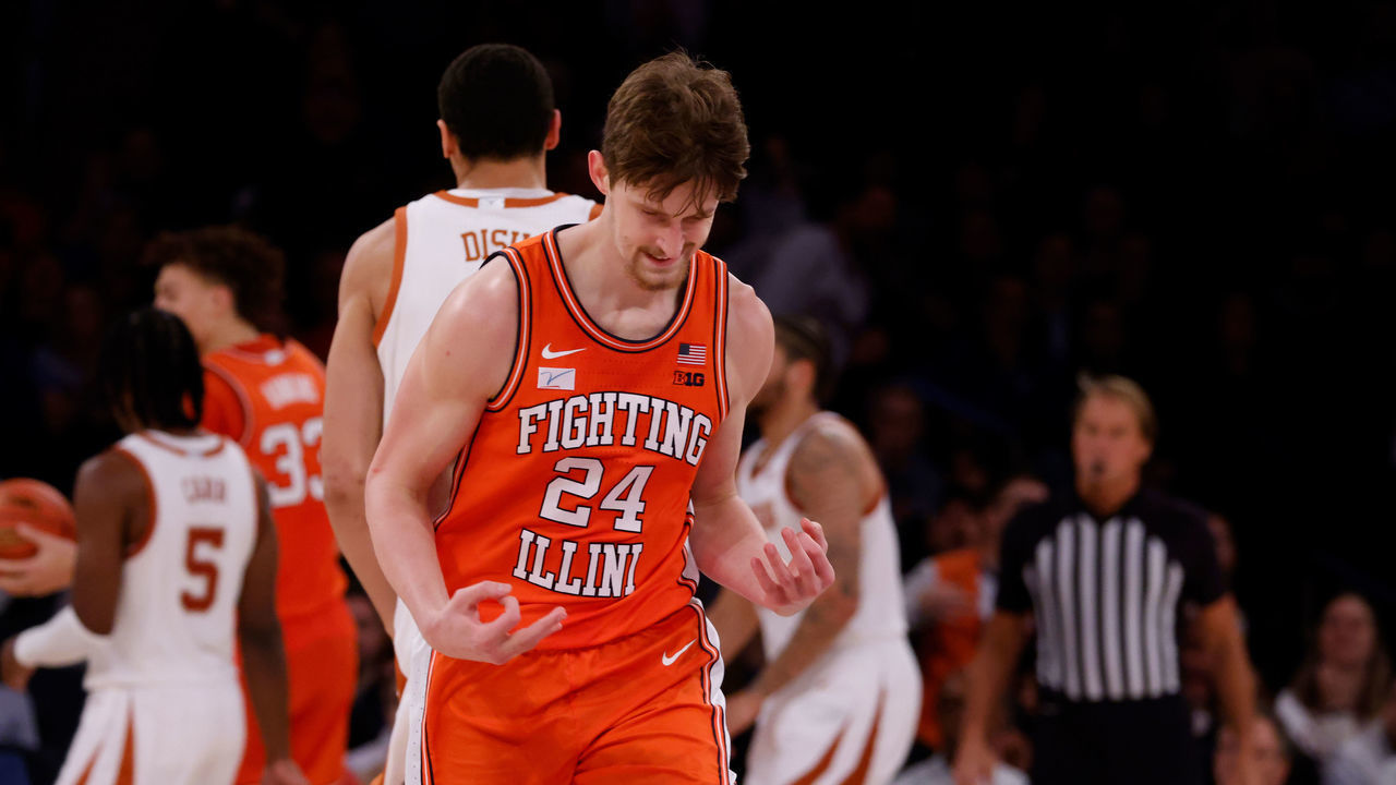 NEW YORK, NY - DECEMBER 06: Matthew Mayer #24 of the Illinois Fighting Illini reacts following a three-point basket during the second half of their game against the Texas Longhorns at Madison Square Garden on December 6, 2022 in New York City.