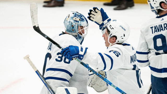 DALLAS, TEXAS - DECEMBER 06: Matt Murray #30 of the Toronto Maple Leafs is congratulated by teammate Mitchell Marner #16 after their game against the Dallas Stars at American Airlines Center on December 06, 2022 in Dallas, Texas.